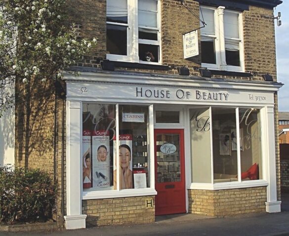 A brick two-storey house with a beauty clinic on the bottom floor