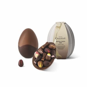 A whole Easter egg, half an egg filled with artisan chocolates and egg-shaped packaging