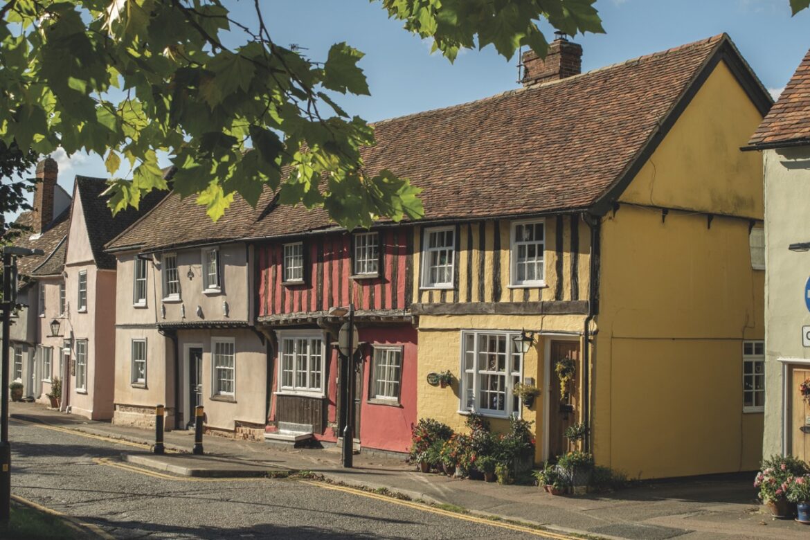 Facade of old colorful Tudor timber framed British cottages at Saffron Walden, England