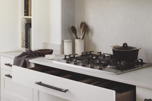 Ivett & Reed (left) and Roundhouse (right) offer invaluable expertise for your kitchen A kitchen hob with a drawer slightly ajar underneath