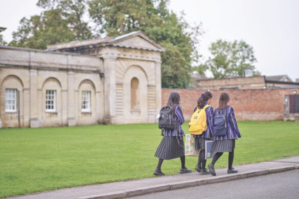 From curriculum to school culture, Kimbolton (above) and Gretton (right) hope to foster inclusive environments. Image by Chris Reeve Three students walking past an ornate school building