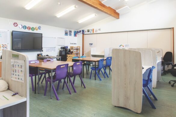 From curriculum to school culture, Kimbolton (left) and Gretton (above) hope to foster inclusive environments. Image by Chris Reeve An empty classroom with small desks and purple and blue chairs