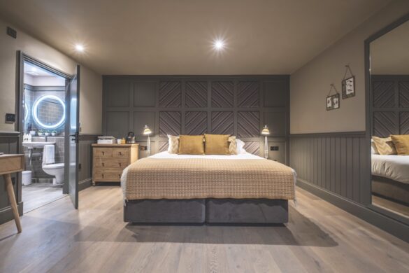 A large double bed in a modern hotel room