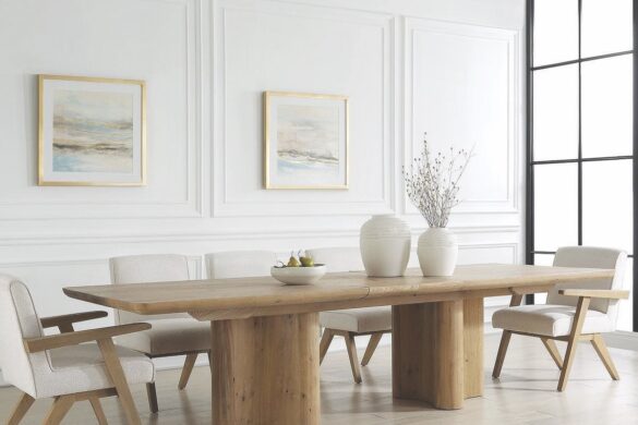 A modern dining room with a large oak table and long windows